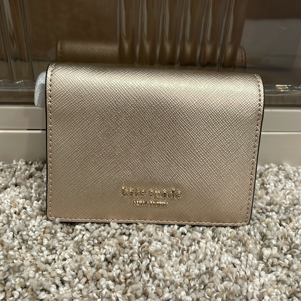 Kate Spade bifold rose gold wallet